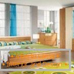 Нијанси на зелена и жолта во дизајнот на спалната соба