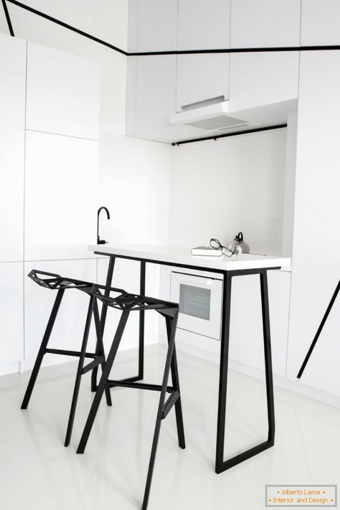 Кујна студиото стан во црно и бело