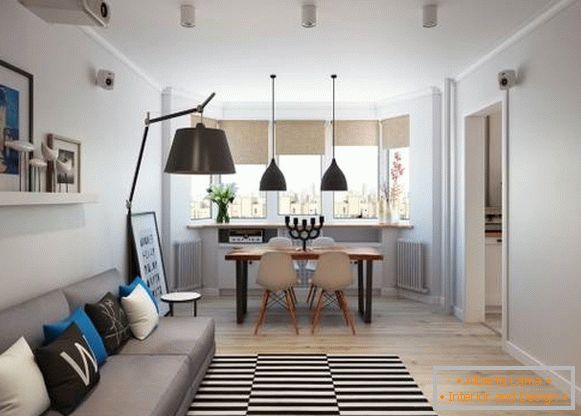 Еднособен стан во скандинавски стил - слика на дневна соба