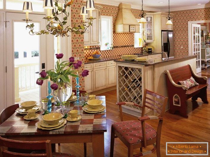 Земја стил е идеален, ако станува збор за украсување кујната простор. Мала кујна во селска куќа во стилот на земјата е одлично место за пријатни семејни собири.