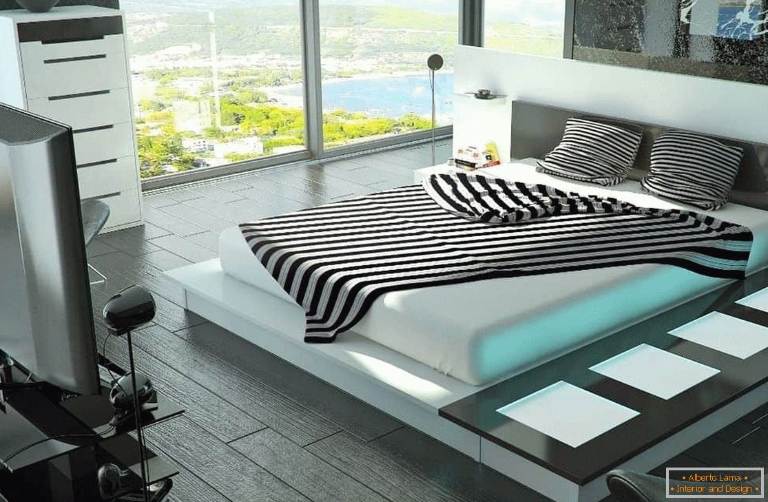 Спална соба со голем кревет со високо-технолошки осветлување