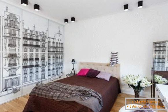 Спална соба дизајн со гардероба на преградата со црна и бела шема