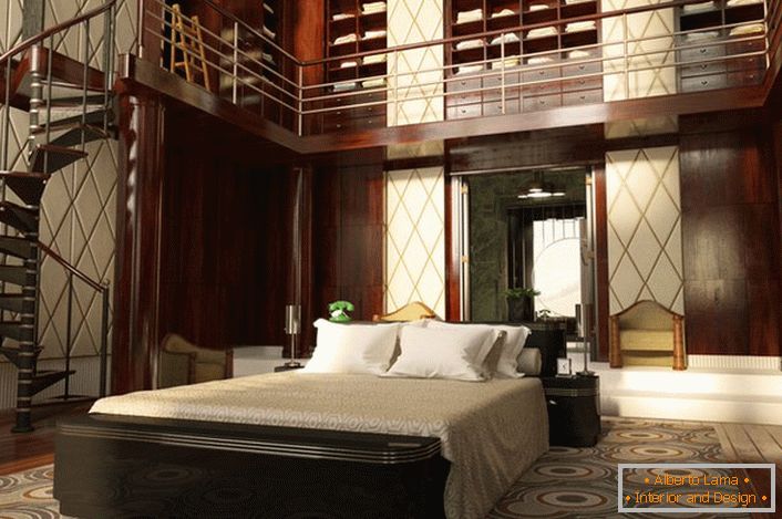Спалната соба со високи тавани е одлично декорирана. Просторот е организиран функционално и едноставно. Спиралната скалила доведува до импресивна гардероба.
